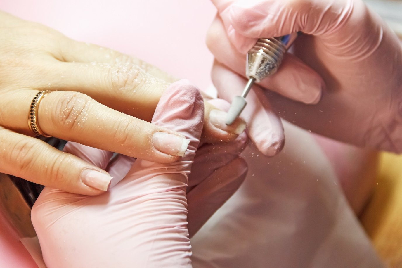 correction and nail extensions,  in a beauty salon